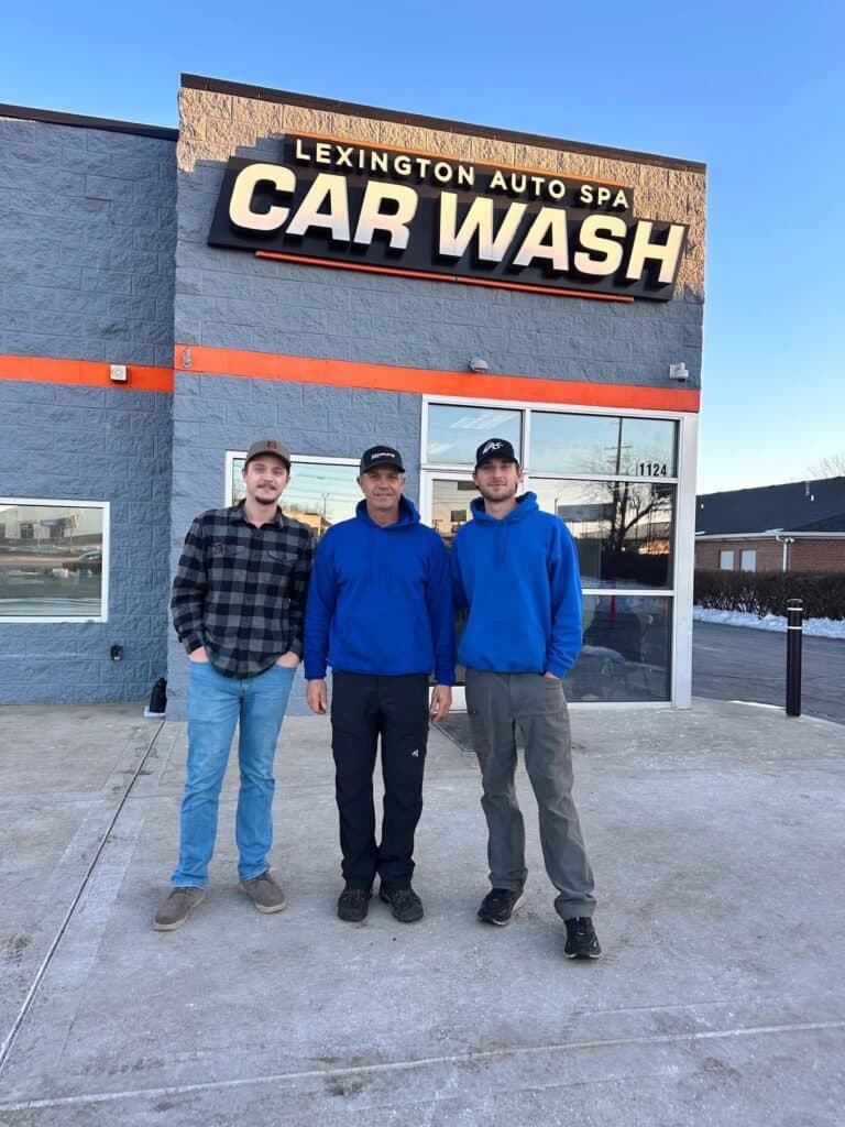 The father and sons who run Lexington Auto Spa, outside the Winchester Road building